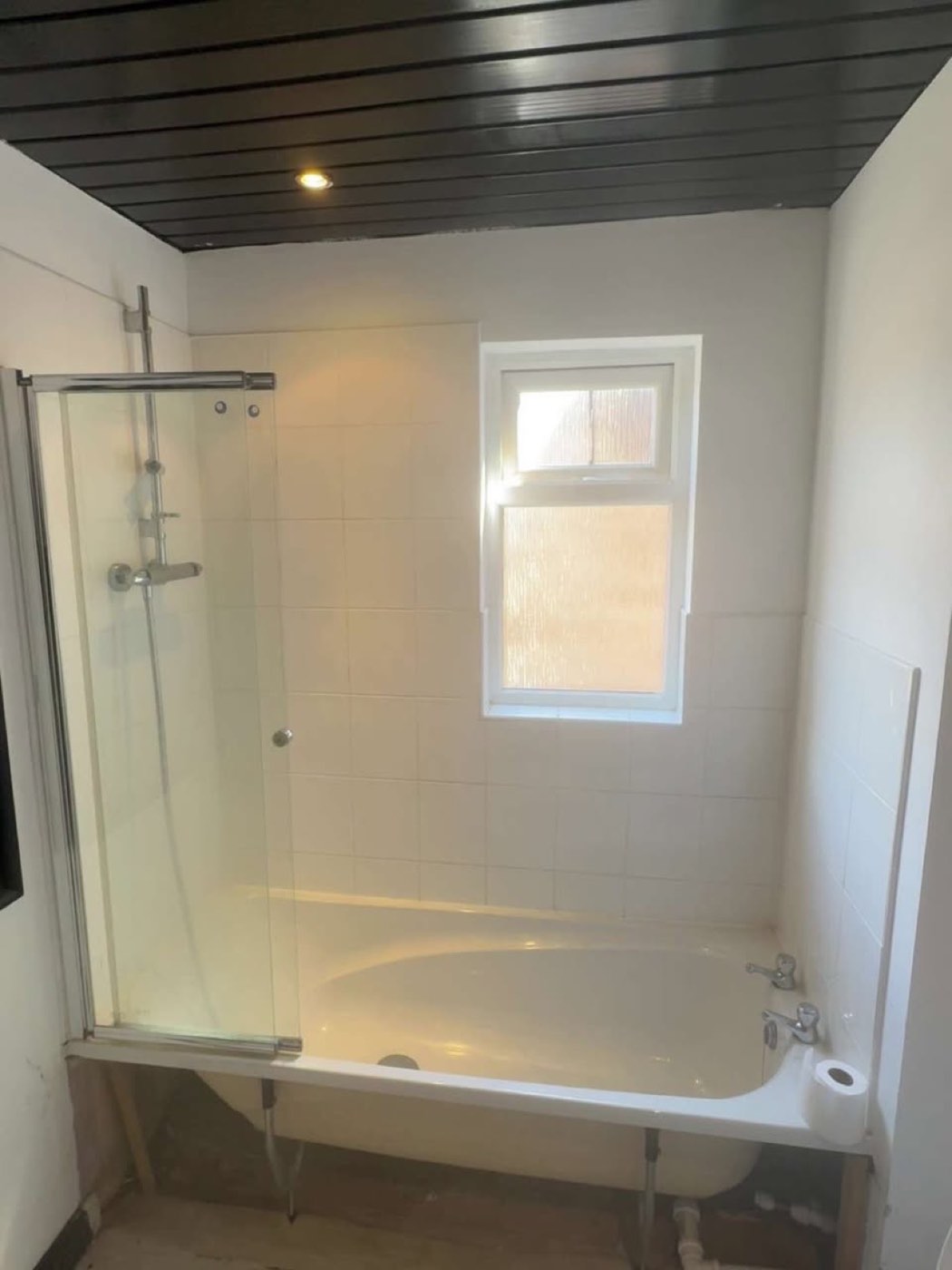 Before: tired white bathroom mid-refit